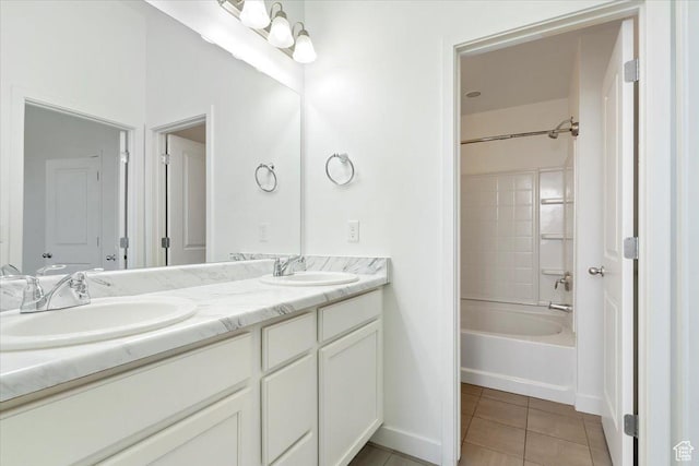 5377 W Bowstring Way S, Jordan, UT 84009 - bathroom featuring double vanity, tile patterned flooring, shower / bathtub combination, and baseboards