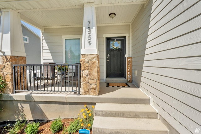 7859 N Sagebrush Ln, Eagle Mountain, UT 84005 - entrance to property featuring stone siding and covered porch