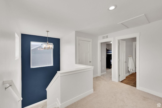 7859 N Sagebrush Ln, Eagle Mountain, UT 84005 - hallway featuring carpet flooring, baseboards, an upstairs landing, a chandelier, and recessed lighting