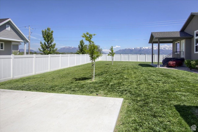 4016 W 625 S, West Point, UT 84015 - view of yard with a mountain view and a patio area