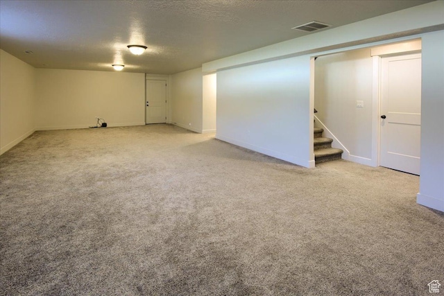4016 W 625 S, West Point, UT 84015 - finished basement featuring carpet, stairs, baseboards, and a textured ceiling