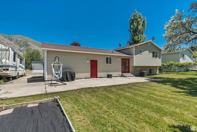 775 N 250 W, Springville, UT 84663 - back of house with entry steps, a patio area, a mountain view, and central air condition unit