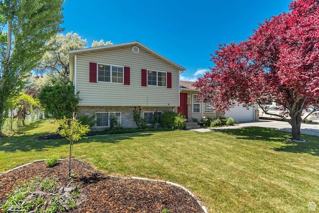 775 N 250 W, Springville, UT 84663 - tri-level home with an attached garage, a front lawn, and concrete driveway