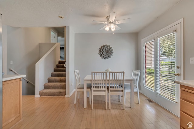 775 N 250 W, Springville, UT 84663 - dining space featuring a ceiling fan, light wood-type flooring, stairs, and baseboards