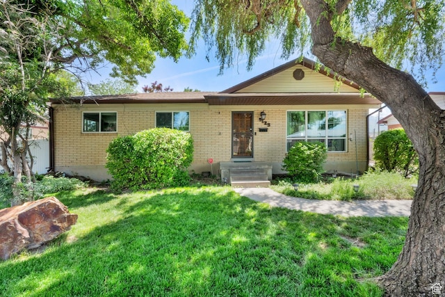 5125 S 1000 E, Salt Lake City, UT 84117 - single story home featuring brick siding and a front yard