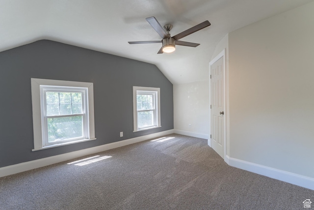 3180 Porter Ave, Ogden, UT 84403 - additional living space with plenty of natural light, lofted ceiling, ceiling fan, and carpet flooring