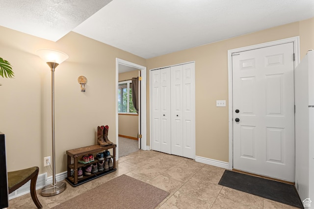 11770 S Dry Creek Rd, Sandy, UT 84094 - foyer entrance featuring baseboards