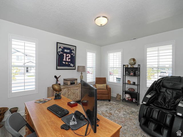 3022 S Shoreline Dr W, Syracuse, UT 84075 - office with wood finished floors, baseboards, and a textured ceiling