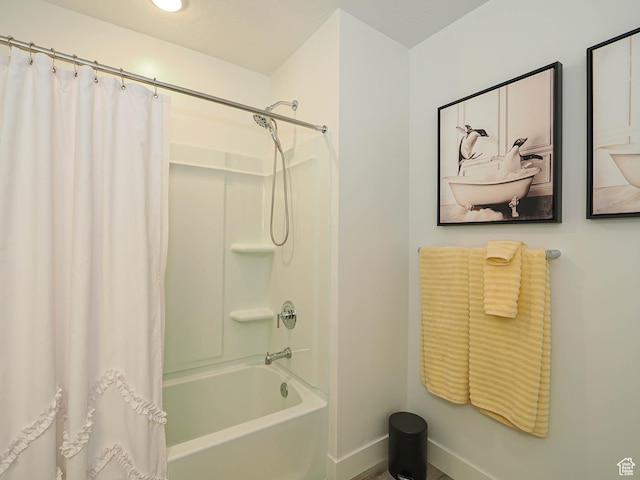 3022 S Shoreline Dr W, Syracuse, UT 84075 - full bathroom with shower / bath combo with shower curtain and baseboards