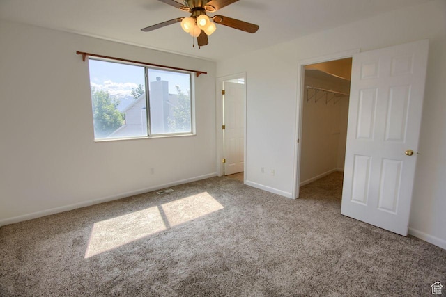 8183 S 2420 W, West Jordan, UT 84088 - unfurnished bedroom with carpet flooring, a walk in closet, baseboards, and a closet