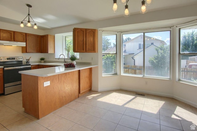 8183 S 2420 W, West Jordan, UT 84088 - kitchen featuring stainless steel electric range oven, under cabinet range hood, a sink, a peninsula, and light countertops