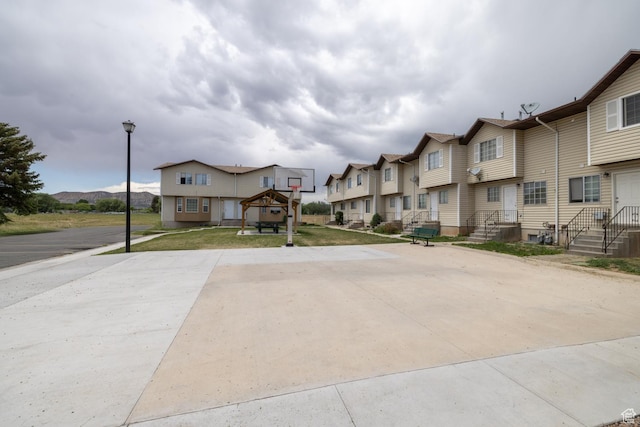 1350 W 150 N Unit 21, Vernal, UT 84078 - view of concrete road featuring a residential view and street lights