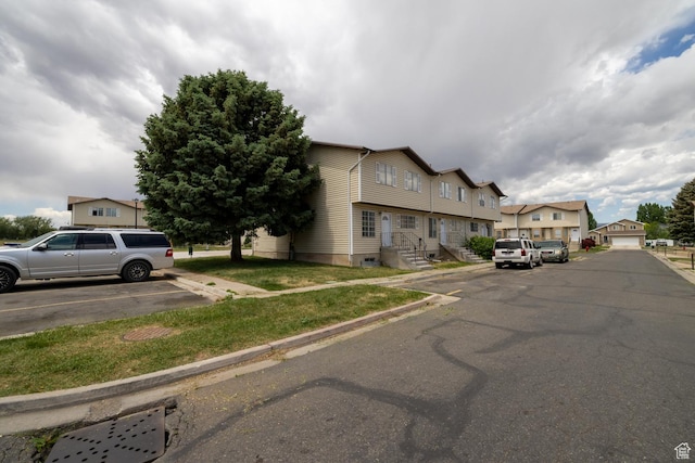 1350 W 150 N Unit 22, Vernal, UT 84078 - view of asphalt road with curbs and a residential view