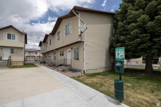 1350 W 150 N Unit 22, Vernal, UT 84078 - view of front of home featuring a front yard