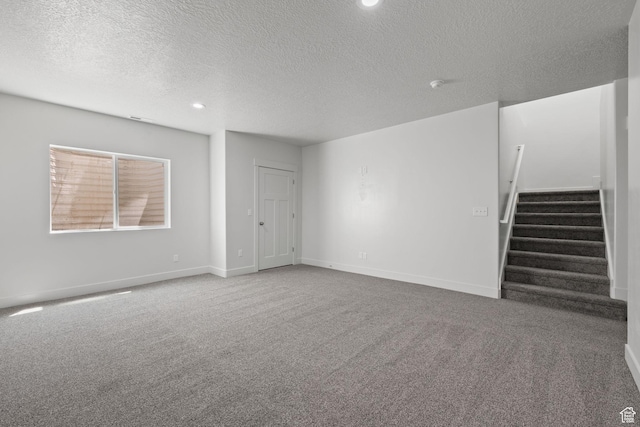 387 N 300 E, Payson, UT 84651 - unfurnished living room with a textured ceiling, carpet, stairway, and recessed lighting