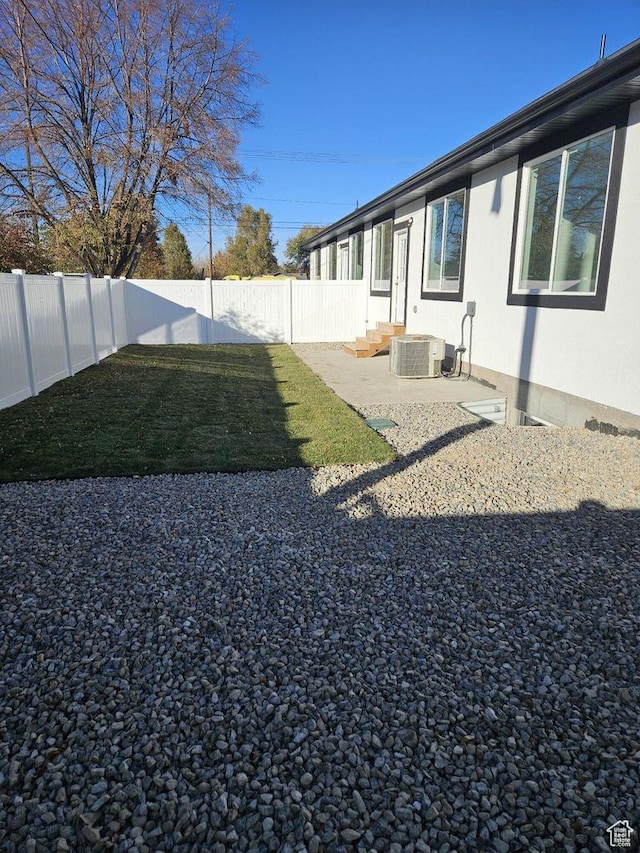 387 N 300 E, Payson, UT 84651 - fenced backyard with a patio and cooling unit