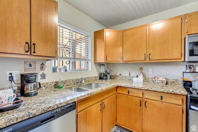 249 S 700 E Unit 58, Salt Lake City, UT 84102 - kitchen featuring stainless steel appliances, a sink, and light stone countertops