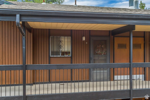 249 S 700 E Unit 58, Salt Lake City, UT 84102 - property entrance with roof with shingles