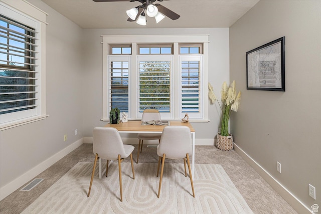 1697 S 3200 W, Logan, UT 84321 - dining space featuring carpet floors, a ceiling fan, baseboards, and a desk