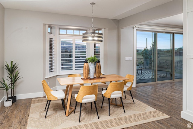 1697 S 3200 W, Logan, UT 84321 - dining area with wood finished floors, baseboards, and a chandelier