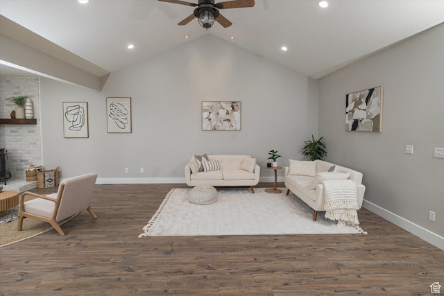 1697 S 3200 W, Logan, UT 84321 - living area featuring recessed lighting, a ceiling fan, baseboards, lofted ceiling, and a wood stove