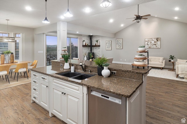 1697 S 3200 W, Logan, UT 84321 - kitchen featuring dishwasher, open floor plan, a sink, a center island with sink, and recessed lighting