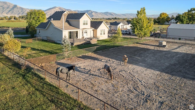 1697 S 3200 W, Logan, UT 84321 - view of front facade with roof with shingles and a deck with mountain view
