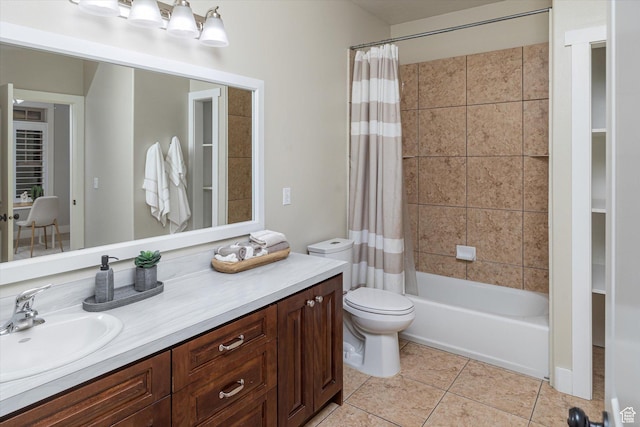 1697 S 3200 W, Logan, UT 84321 - full bathroom with vanity, tile patterned floors, shower / bath combo with shower curtain, and toilet
