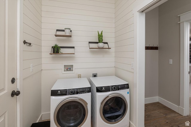 1697 S 3200 W, Logan, UT 84321 - washroom with washing machine and clothes dryer, dark wood-type flooring, baseboards, and wooden walls