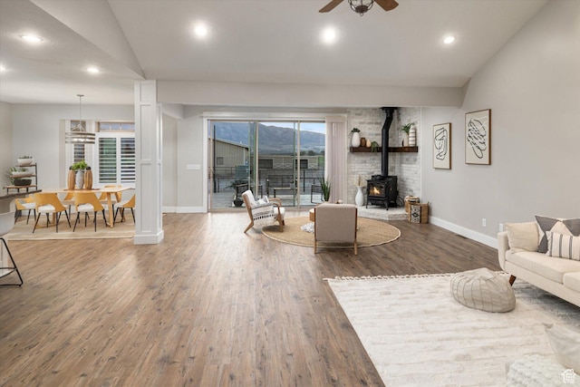 1697 S 3200 W, Logan, UT 84321 - living area with baseboards, a ceiling fan, plenty of natural light, recessed lighting, and vaulted ceiling
