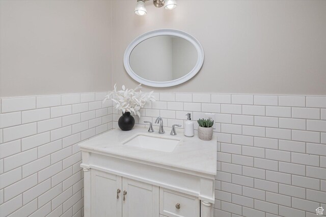 1697 S 3200 W, Logan, UT 84321 - bathroom with vanity and tile walls