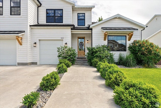 144 E 150 N, Vineyard, UT 84059 - view of front of property with a garage and concrete driveway