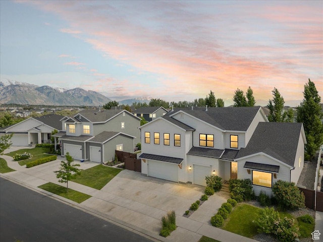 144 E 150 N, Vineyard, UT 84059 - view of front of property featuring an attached garage, driveway, a standing seam roof, a residential view, and metal roof