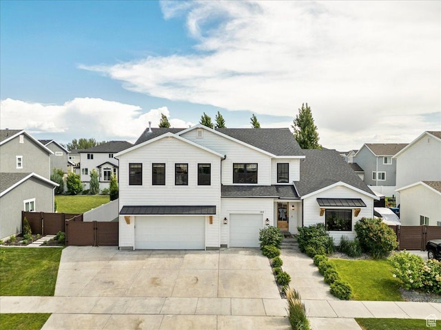 144 E 150 N, Vineyard, UT 84059 - modern inspired farmhouse featuring a garage, concrete driveway, a gate, a residential view, and a shingled roof