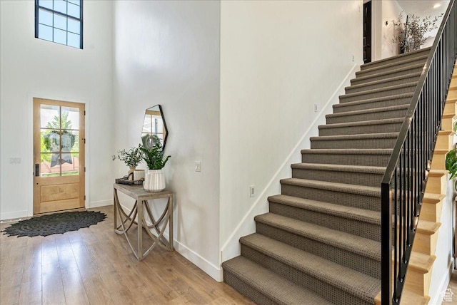 144 E 150 N, Vineyard, UT 84059 - entrance foyer featuring stairway, light wood-type flooring, baseboards, and a high ceiling
