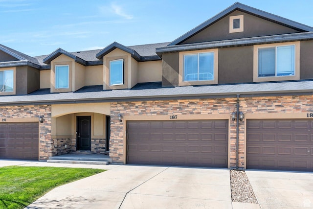 187 E 560 N, Salem, UT 84653 - multi unit property featuring stone siding, stucco siding, concrete driveway, and a garage