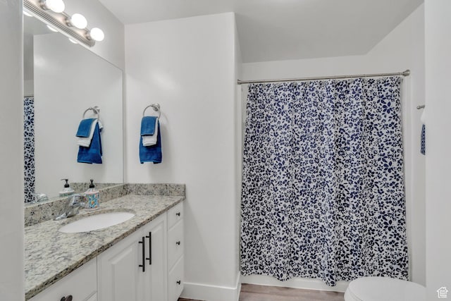 187 E 560 N, Salem, UT 84653 - full bathroom featuring vanity, toilet, a shower with curtain, and baseboards