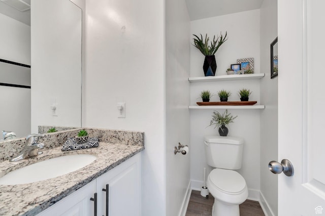 187 E 560 N, Salem, UT 84653 - half bath with toilet, vanity, wood finished floors, and baseboards