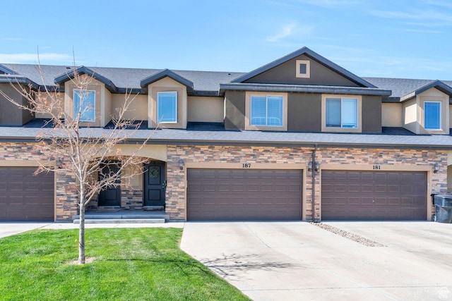 187 E 560 N, Salem, UT 84653 - multi unit property with stucco siding, concrete driveway, a garage, and stone siding