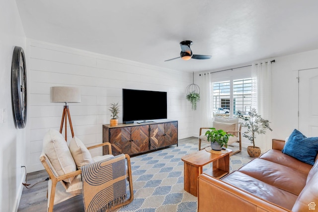 187 E 560 N, Salem, UT 84653 - living area featuring a ceiling fan, wood walls, and baseboards