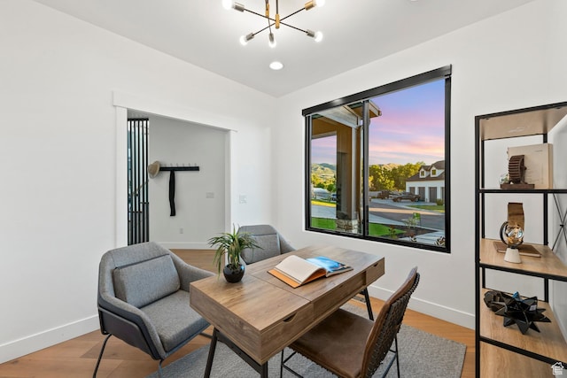 12719 S Outlaw Pl E, Draper, UT 84020 - home office featuring a chandelier, baseboards, and light wood finished floors