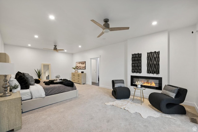 12719 S Outlaw Pl E, Draper, UT 84020 - bedroom with recessed lighting, a glass covered fireplace, carpet floors, baseboards, and a ceiling fan