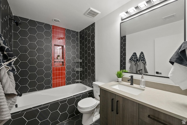 12719 S Outlaw Pl E, Draper, UT 84020 - bathroom featuring toilet, vanity, tiled shower / bath combo, and tile patterned flooring