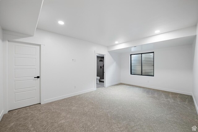 12719 S Outlaw Pl E, Draper, UT 84020 - spare room featuring carpet flooring, baseboards, and recessed lighting