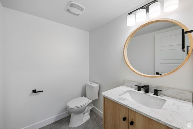 12719 S Outlaw Pl E, Draper, UT 84020 - bathroom featuring vanity, baseboards, and toilet