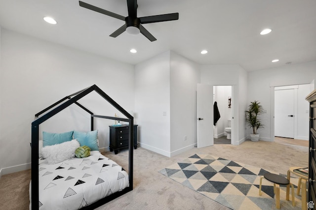 12719 S Outlaw Pl E, Draper, UT 84020 - bedroom with light carpet, recessed lighting, baseboards, and connected bathroom