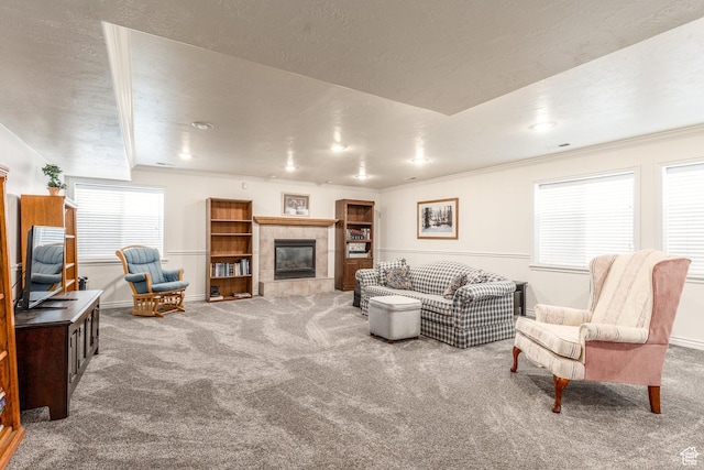 497 E Spruce Glen Rd, Murray, UT 84107 - living area featuring carpet, a tiled fireplace, baseboards, and ornamental molding