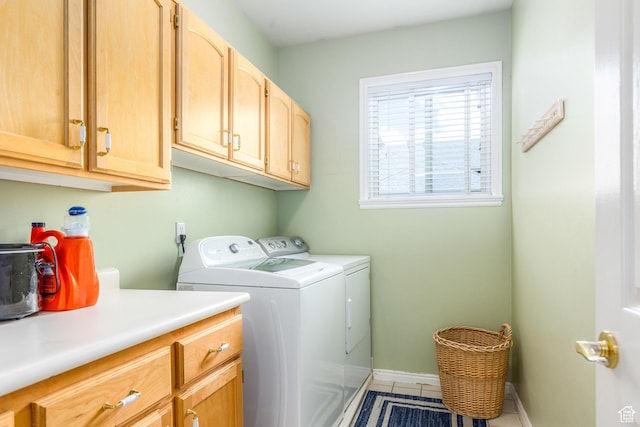 497 E Spruce Glen Rd, Murray, UT 84107 - washroom featuring cabinet space, washer and clothes dryer, tile patterned floors, and baseboards
