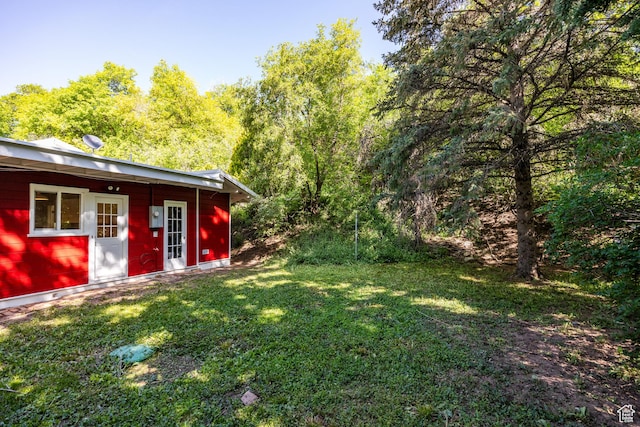 5623 E Emigration Canyon Rd, Emigration Canyon, UT 84108 - view of green lawn featuring a forest view