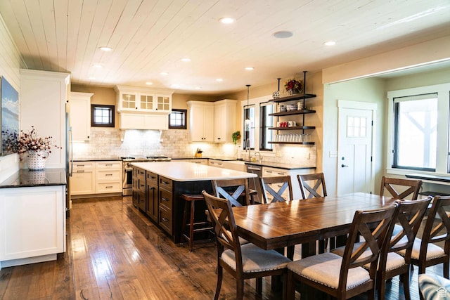 300 S 100th St W, Garden City, UT 84028 - dining room with recessed lighting, wood ceiling, dark wood finished floors, and plenty of natural light